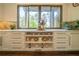 Lots of counter space and cabinet storage in this kitchen. View of green trees out the window at 23 Sunset Se Rdg, Cartersville, GA 30121