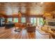 Beautiful living room features a stone fireplace and lots of natural light at 23 Sunset Se Rdg, Cartersville, GA 30121