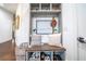 Well-organized mudroom with custom built-ins, bench seating, storage cubbies, and hooks for easy organization at 23 Sunset Se Rdg, Cartersville, GA 30121
