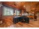 Bright office with views, dual monitors, hardwood floors, and wood paneled walls at 23 Sunset Se Rdg, Cartersville, GA 30121