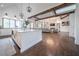 Open concept floor plan features white kitchen and cozy living room with vaulted ceilings and natural light at 23 Sunset Se Rdg, Cartersville, GA 30121