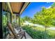 Charming front porch with stone floor and rocking chairs at 23 Sunset Se Rdg, Cartersville, GA 30121