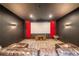 Enjoy movie nights in this theater room with comfortable seating, large screen, and mood lighting at 23 Sunset Se Rdg, Cartersville, GA 30121