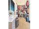 Large walk-in closet featuring custom shelving and ample storage space for clothes at 23 Sunset Se Rdg, Cartersville, GA 30121