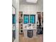 Spacious walk-in closet with custom shelving, vanity, and stylish decor at 23 Sunset Se Rdg, Cartersville, GA 30121