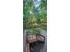 Landscaped backyard with bridge, greenery, and shade trees for outdoor enjoyment at 2511 Oak Ave, Tucker, GA 30084