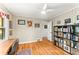 Inviting bedroom with hardwood floors, neutral walls, and a designated workspace at 2511 Oak Ave, Tucker, GA 30084