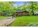 Charming brick home featuring a well-maintained front yard and inviting entrance staircase at 2511 Oak Ave, Tucker, GA 30084