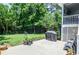 Backyard patio area perfect for outdoor entertaining with covered grill at 5199 Beech Forest Sw Dr, Lilburn, GA 30047