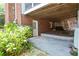 Basement level with walkout access to backyard and concrete patio at 5199 Beech Forest Sw Dr, Lilburn, GA 30047