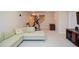 Finished basement with a couch, stationary bike, and entertainment center at 5199 Beech Forest Sw Dr, Lilburn, GA 30047