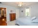 Bedroom with carpet, dresser, and a window providing natural light at 5199 Beech Forest Sw Dr, Lilburn, GA 30047