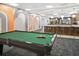 Spacious billiards room featuring a pool table and kitchenette area at 620 Peachtree Ne St # 1716, Atlanta, GA 30308