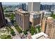 A high-rise building with balconies and city surroundings, showcasing its integration with the urban environment at 620 Peachtree Ne St # 1716, Atlanta, GA 30308