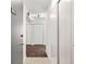 Condo hallway featuring unit number, wood floors, and storage space at 620 Peachtree Ne St # 1716, Atlanta, GA 30308