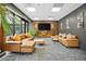 Relaxing resident lounge with comfortable seating, large screen TV, and stylish decor at 620 Peachtree Ne St # 1716, Atlanta, GA 30308