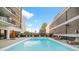 Inviting swimming pool with comfortable loungers and city views at 620 Peachtree Ne St # 1716, Atlanta, GA 30308