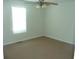 Simple bedroom with carpet flooring and a ceiling fan at 230 Happy Valley Church Rd, Dallas, GA 30157
