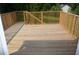 Large, fenced wooden deck, perfect for outdoor relaxation and entertaining at 230 Happy Valley Church Rd, Dallas, GA 30157