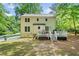 Expansive backyard with a wooden deck perfect for outdoor entertaining and enjoying nature at 3306 Emory Dr, Marietta, GA 30062
