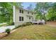 Spacious backyard featuring a deck, patio and lush green space at 3306 Emory Dr, Marietta, GA 30062