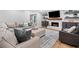 Inviting living area showcasing a painted brick fireplace, built-in cabinets, and stylish furnishings at 3306 Emory Dr, Marietta, GA 30062