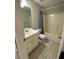 Clean bathroom with a shower-tub combo and vanity with storage at 50 Glenmore Dr, Kingston, GA 30145