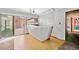 This unique bar area features a counter, window, sliding glass door, and vintage-style flooring at 5800 Mitchell Rd, Atlanta, GA 30328