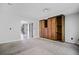 The bedroom offers carpet, built in storage, and neutral paint at 5800 Mitchell Rd, Atlanta, GA 30328