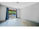 Bedroom featuring a sliding glass door leading to the outside and gray walls at 5800 Mitchell Rd, Atlanta, GA 30328