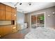 This unique bedroom offers built-in storage, sliding glass doors, and laminate wood flooring at 5800 Mitchell Rd, Atlanta, GA 30328
