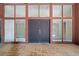 Entryway with windows and double doors leading into the home at 5800 Mitchell Rd, Atlanta, GA 30328