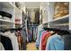 Walk-in closet featuring custom shelving and ample storage space for clothes and accessories at 6851 Roswell Rd # K-23, Atlanta, GA 30328