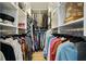 Walk-in closet with custom shelving and ample space for storage and organization at 6851 Roswell Rd # K-23, Atlanta, GA 30328
