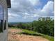 Enjoy tranquil views from this beautiful lot with lush landscaping and wooded backdrop at 237 Laurel Vista Dr, Canton, GA 30114