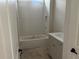 Bright bathroom showcases a shower/tub combo with white subway tile and a vanity with storage at 237 Laurel Vista Dr, Canton, GA 30114