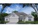 Beautiful single-story home boasting a stylish exterior and attached two-car garage at 237 Laurel Vista Dr, Canton, GA 30114