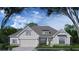 Charming home exterior rendering showcases stone accents and siding at 237 Laurel Vista Dr, Canton, GA 30114