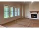Spacious living room featuring a brick fireplace and large windows at 237 Laurel Vista Dr, Canton, GA 30114