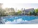Community pool featuring plenty of seating and a clubhouse at 237 Laurel Vista Dr, Canton, GA 30114