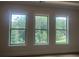 Windows provide natural light with views of the trees outdoors at 237 Laurel Vista Dr, Canton, GA 30114