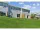 Spacious backyard with a lush green lawn and well-maintained landscaping at 5221 Sherwood Way, Cumming, GA 30040