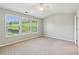 Spacious bedroom with large windows offering plenty of natural light and outdoor views at 5221 Sherwood Way, Cumming, GA 30040