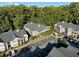 Overhead shot of apartments with ample parking, beautifully landscaped grounds, and mature trees at 1102 Madison Ln # 1102, Smyrna, GA 30080