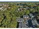 Aerial view of a community surrounded by dense trees, showcasing a serene and private environment at 1102 Madison Ln # 1102, Smyrna, GA 30080