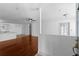 Bright living room with hardwood floors and access to the kitchen, freshly painted at 1102 Madison Ln # 1102, Smyrna, GA 30080
