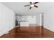 Spacious living room with hardwood floors and an open floor plan leading to the stylish kitchen at 1102 Madison Ln # 1102, Smyrna, GA 30080
