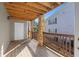 Spacious outdoor porch area with wooden floors and a view of the complex at 1102 Madison Ln # 1102, Smyrna, GA 30080