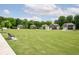 Picturesque community featuring a well-maintained lawn and inviting seating area for residents at 1809 Hanwoo Ln, Powder Springs, GA 30127