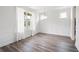 Bright dining room with large windows, providing natural light at 1809 Hanwoo Ln, Powder Springs, GA 30127